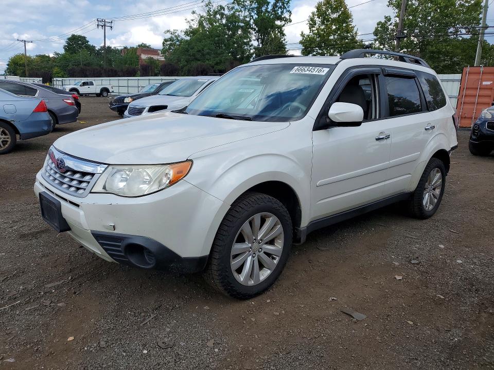 SUBARU FORESTER 2011 with VIN JF2SHADC8BH755821 - Photo from auction