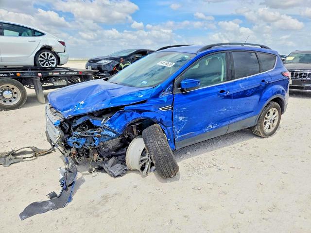FORD ESCAPE 2018 with VIN 1FMCU0GD5JUD56993 - Photo from auction