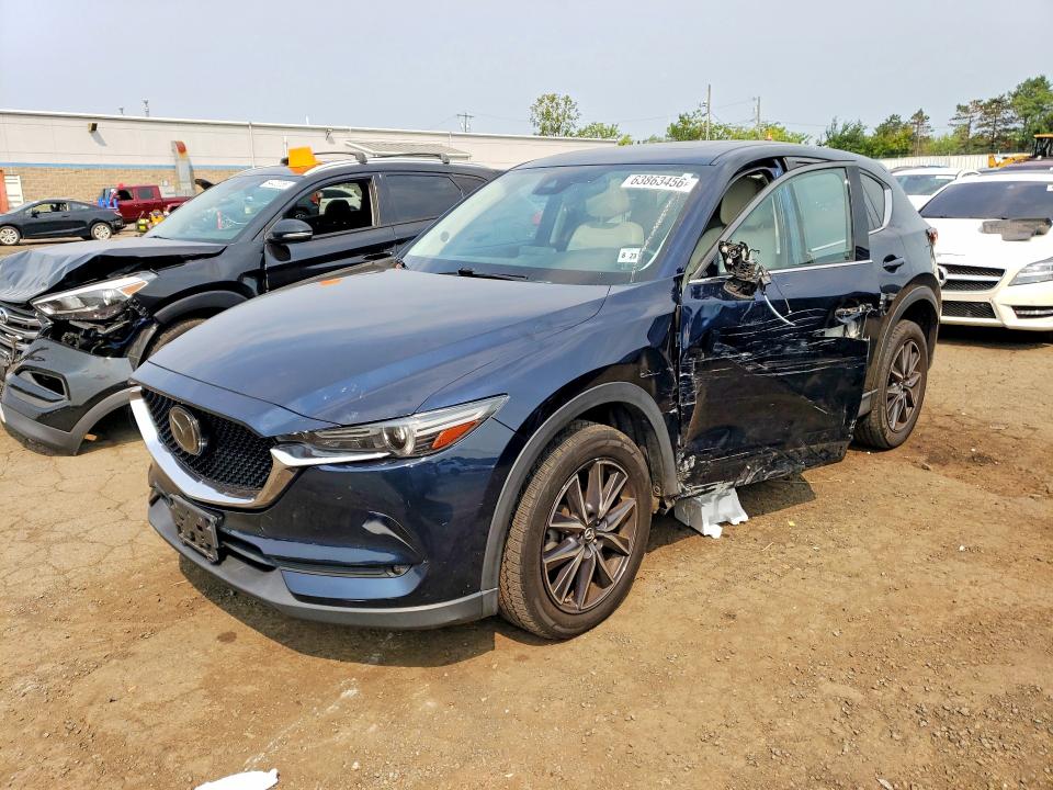 MAZDA CX-5 2018 with VIN JM3KFBDM3J0434860 - Photo from auction