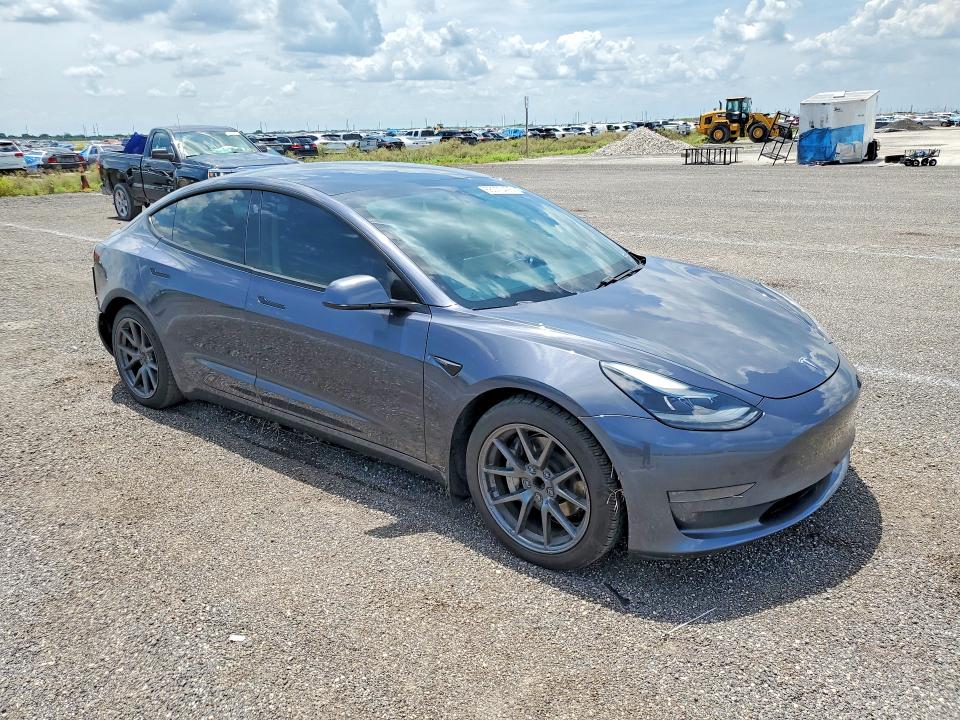Photo 4 from auction – 2021 TESLA MODEL 3 with VIN 5YJ3E1EAXMF083076