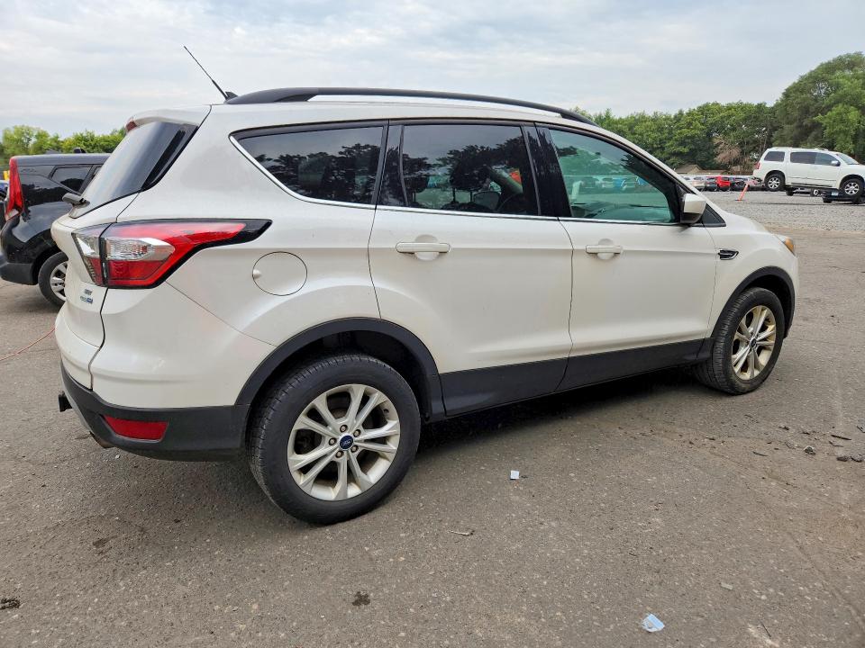 Photo 3 from auction – 2018 FORD ESCAPE with VIN 1FMCU9GD4JUD37212