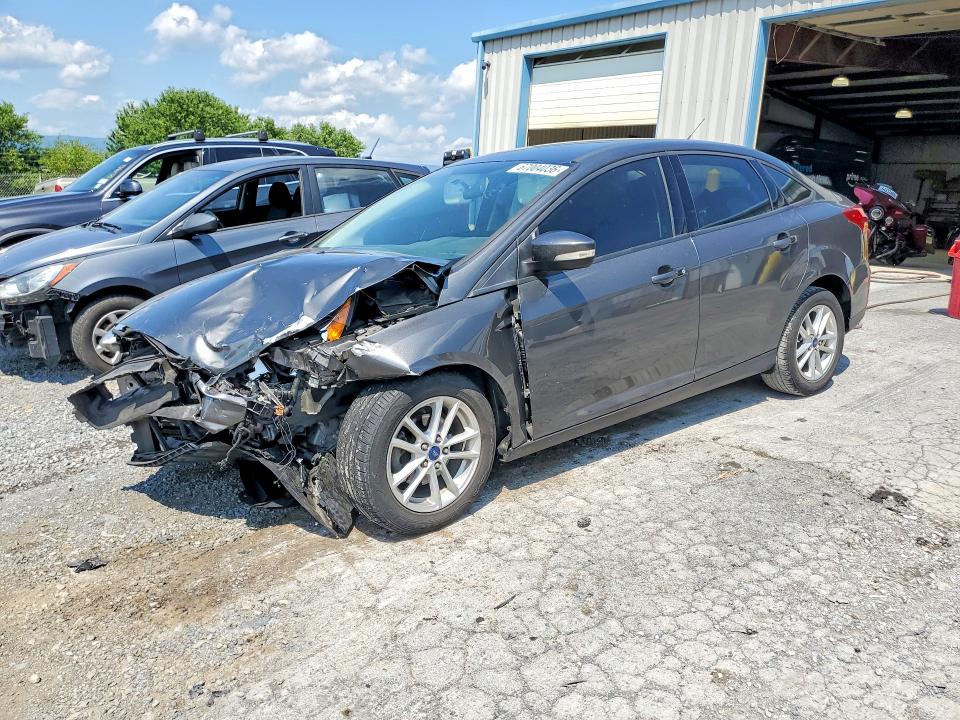 FORD FOCUS 2017 with VIN 1FADP3F25HL233069 - Photo from auction