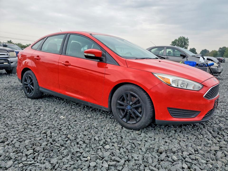 Photo 4 from auction – 2016 FORD FOCUS with VIN 1FADP3F21GL398177