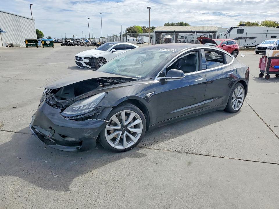 TESLA MODEL 3 2018 with VIN 5YJ3E1EB5JF144273 - Photo from auction
