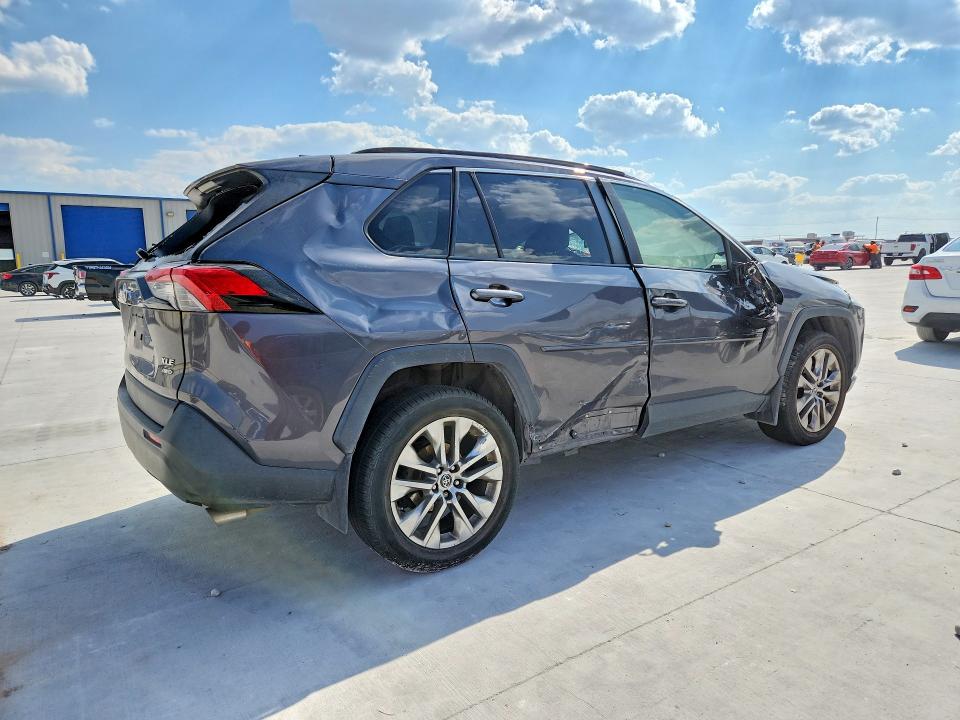 Photo 3 from auction – 2019 TOYOTA RAV4 with VIN JTMA1RFV3KJ009877