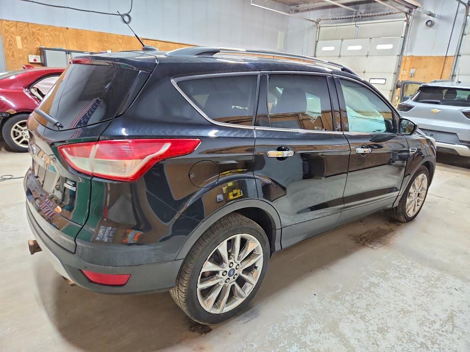 Photo 3 from auction – 2016 FORD ESCAPE with VIN 1FMCU9G90GUA36733