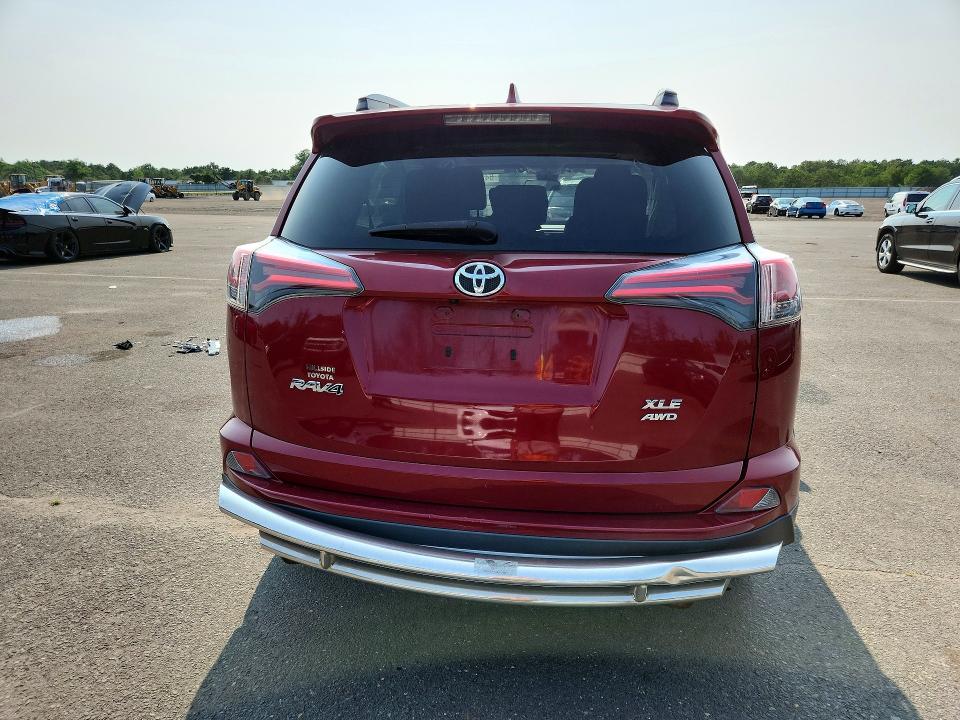 Photo 6 from auction – 2018 TOYOTA RAV4 with VIN 2T3RFREV0JW813415
