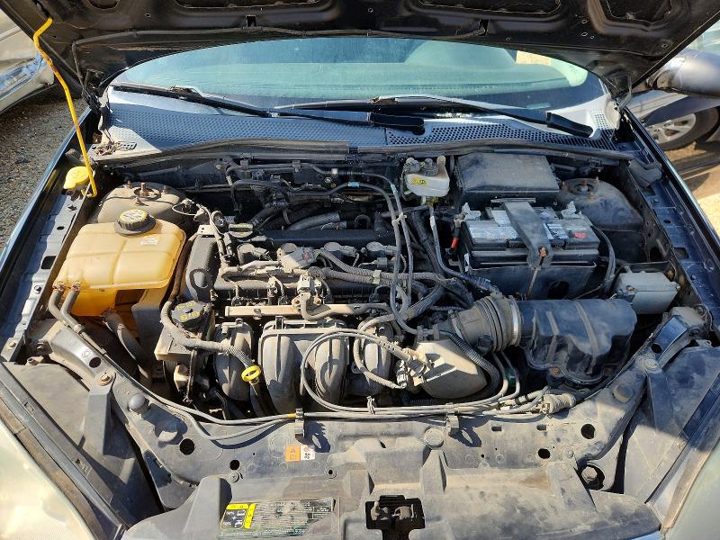Photo 11 from auction – 2007 FORD FOCUS with VIN 1FAHP34N27W362897