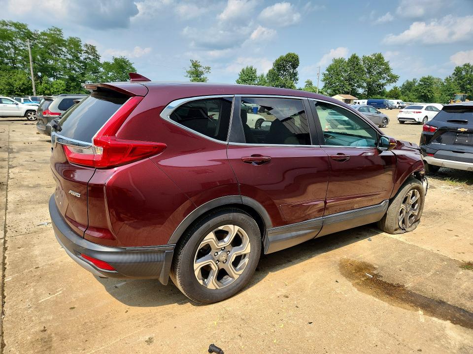 Photo 3 from auction – 2019 HONDA CR-V with VIN 2HKRW2H50KH620693