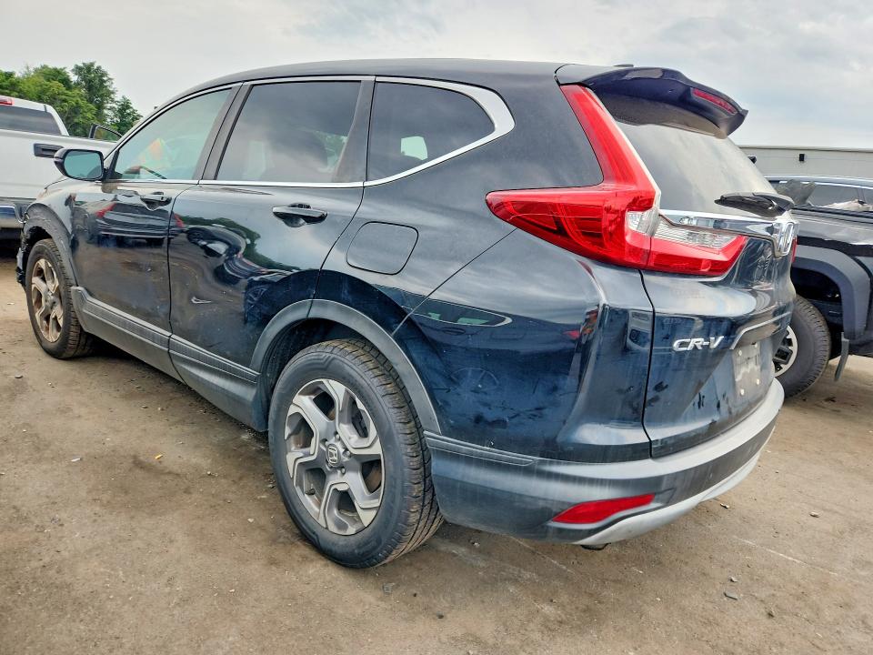 Photo 2 from auction – 2018 HONDA CR-V with VIN 7FARW2H84JE000120