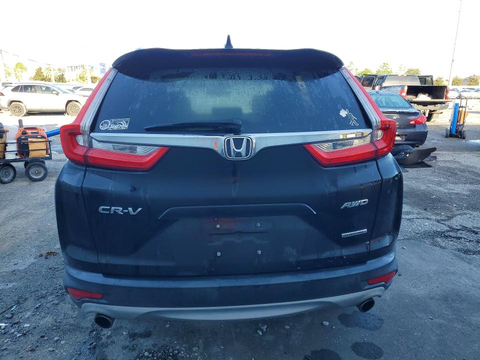 Photo 6 from auction – 2018 HONDA CR-V with VIN 7FARW2H93JE038530