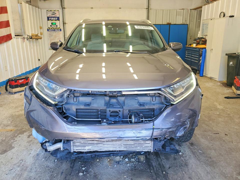 Photo 5 from auction – 2018 HONDA CR-V with VIN 7FARW1H98JE011396