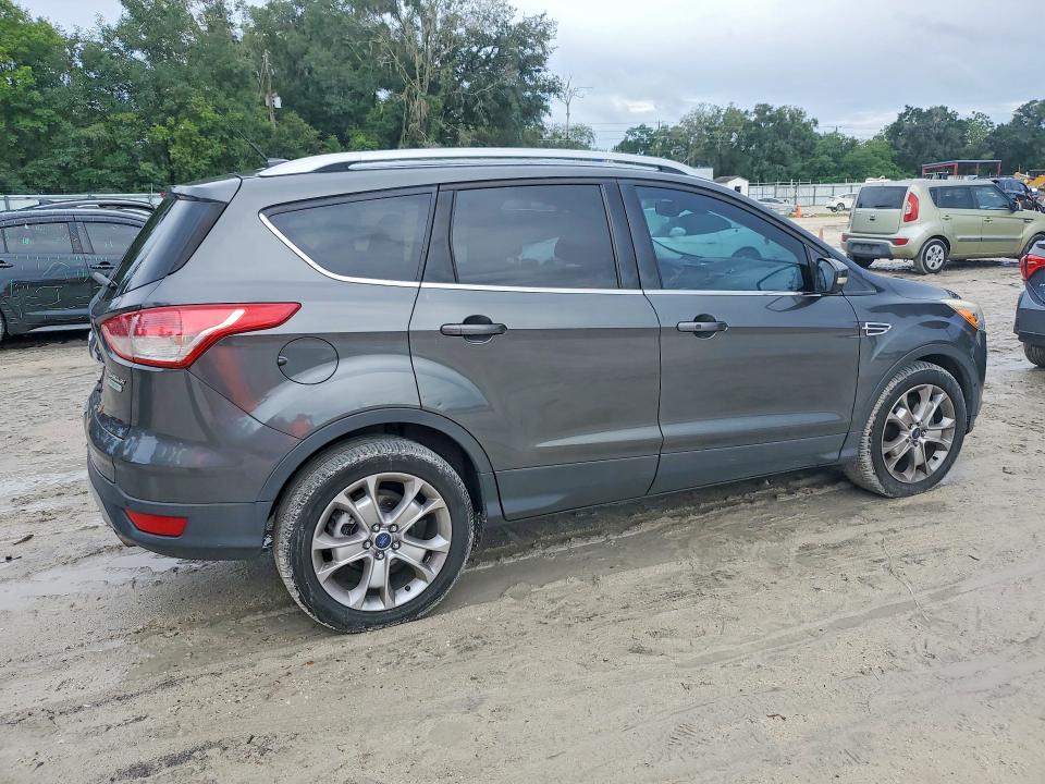 Photo 3 from auction – 2016 FORD ESCAPE with VIN 1FMCU0JX0GUA83280