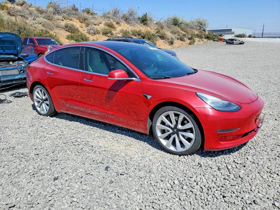 Photo 4 from auction – 2018 TESLA MODEL 3 with VIN 5YJ3E1EB1JF100805
