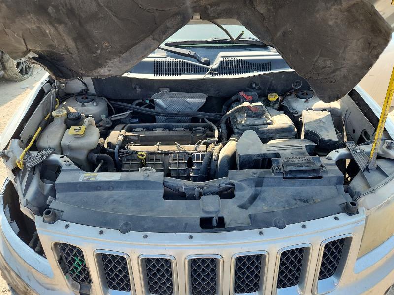Photo 12 from auction – 2014 JEEP COMPASS with VIN 1C4NJCBA7ED548202