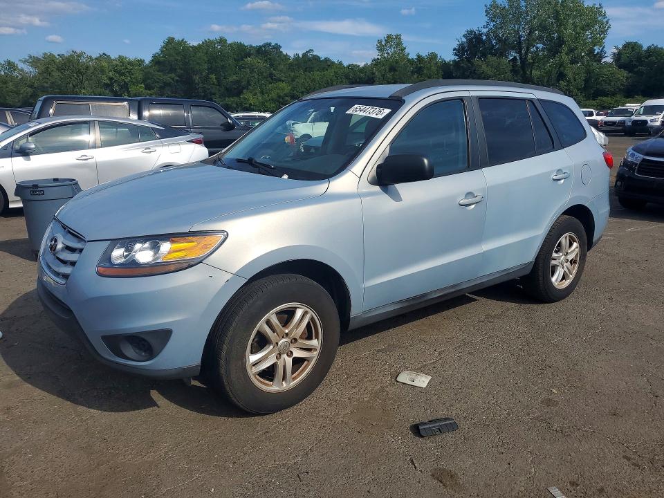 HYUNDAI SANTA FE 2010 with VIN 5NMSGDAB5AH372155 - Photo from auction