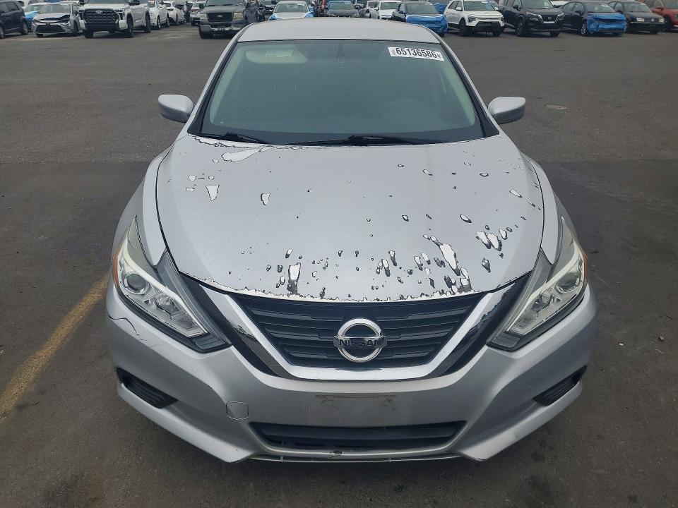Photo 5 from auction – 2016 NISSAN ALTIMA with VIN 1N4AL3APXGC234783