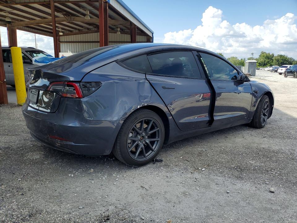 Photo 3 from auction – 2023 TESLA MODEL 3 with VIN 5YJ3E1EAXPF498757