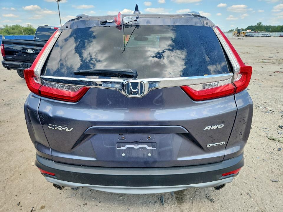 Photo 6 from auction – 2017 HONDA CR-V with VIN 5J6RW2H92HL051086