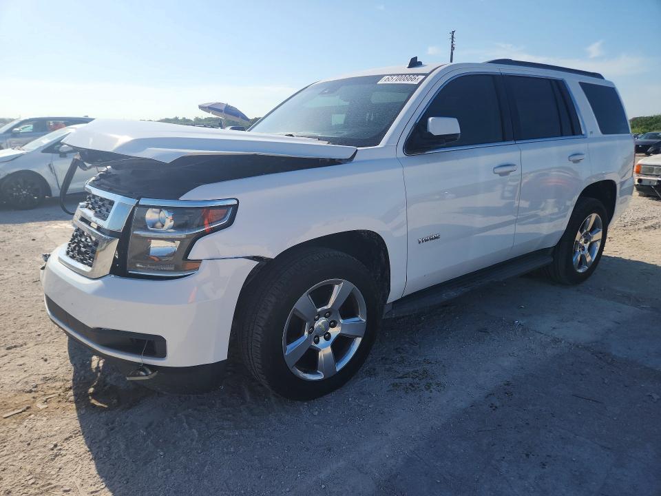 CHEVROLET TAHOE 2015 with VIN 1GNSCBKCXFR284560 - Photo from auction