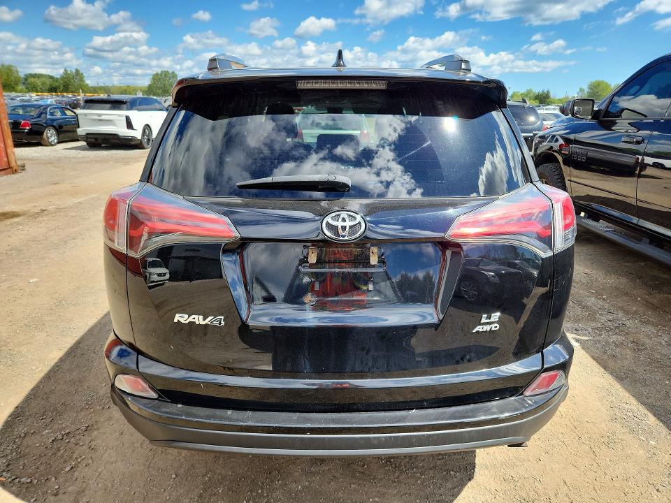 Photo 6 from auction – 2018 TOYOTA RAV4 with VIN 2T3BFREV6JW790479