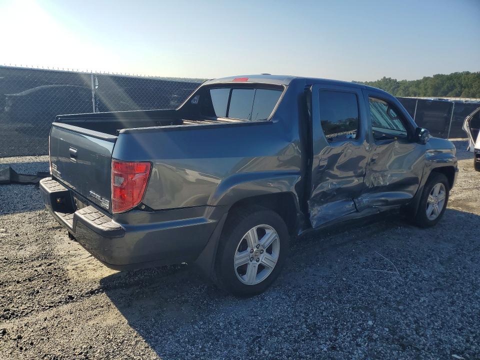 Photo 3 from auction – 2011 HONDA RIDGELINE with VIN 5FPYK1F52BB453067