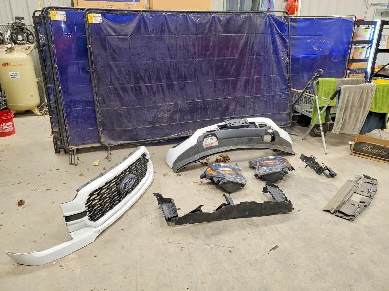 Photo 12 from auction – 2023 FORD F150 with VIN 1FTFW1E5XPKD57381