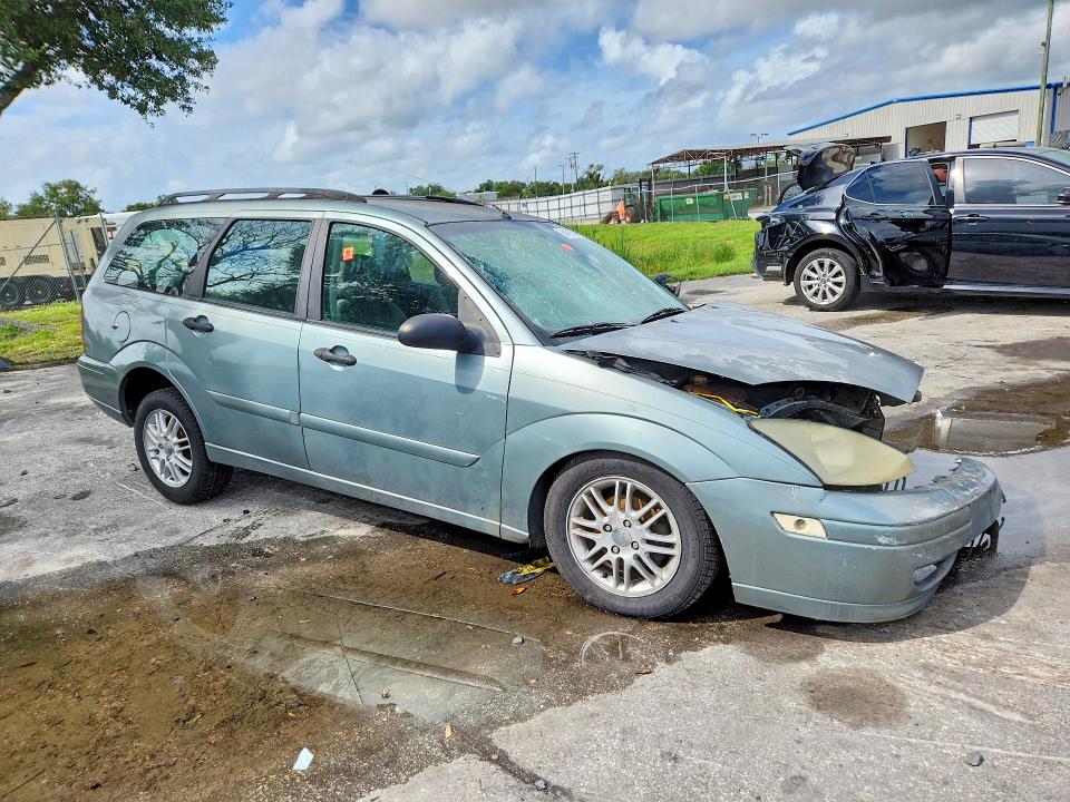 Photo 4 from auction – 2003 FORD FOCUS with VIN 1FAFP36383W213942