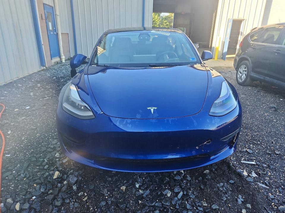 Photo 5 from auction – 2022 TESLA MODEL 3 with VIN 5YJ3E1EA7NF369517