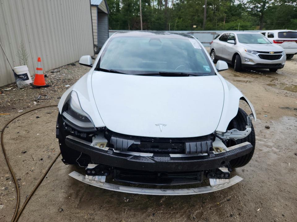 Photo 5 from auction – 2022 TESLA MODEL 3 with VIN 5YJ3E1EB5NF289738