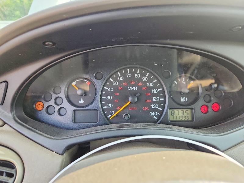 Photo 9 from auction – 2003 FORD FOCUS with VIN 1FAHP36393W340000