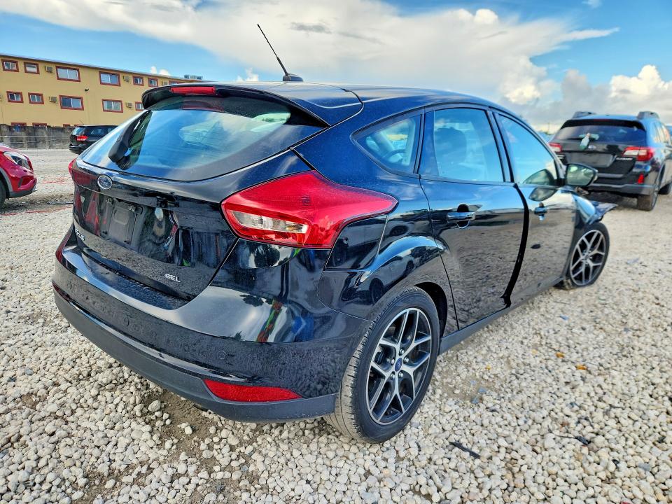 Photo 3 from auction – 2018 FORD FOCUS with VIN 1FADP3M28JL265863