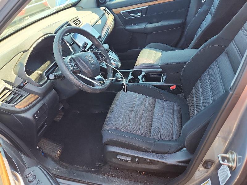 Photo 7 from auction – 2018 HONDA CR-V with VIN 7FARW2H57JE009321
