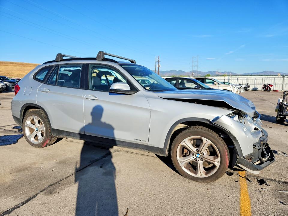 Photo 4 from auction – 2015 BMW X1 with VIN WBAVM5C53FVV94851