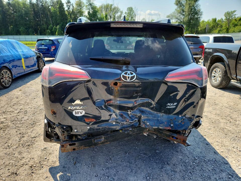 Photo 6 from auction – 2017 TOYOTA RAV4 with VIN JTMRFREV0HJ171111