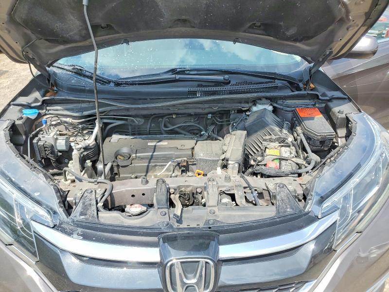 Photo 12 from auction – 2016 HONDA CR-V with VIN 2HKRM4H71GH695851