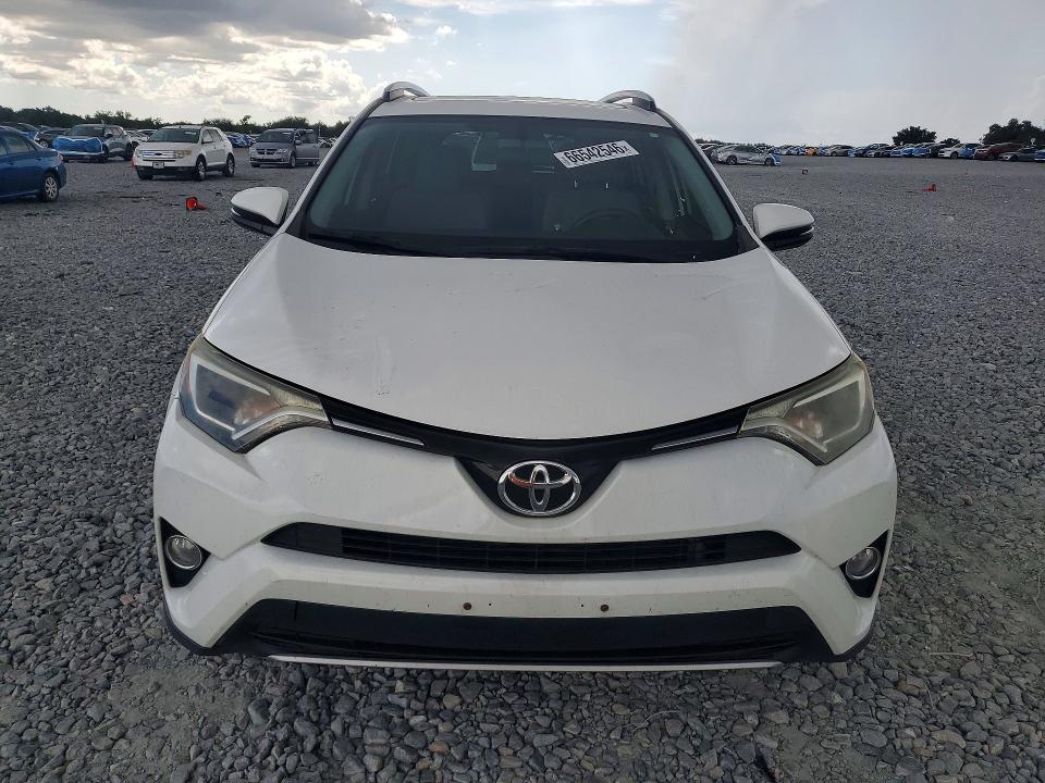 Photo 5 from auction – 2016 TOYOTA RAV4 with VIN JTMRFREV7GJ090234