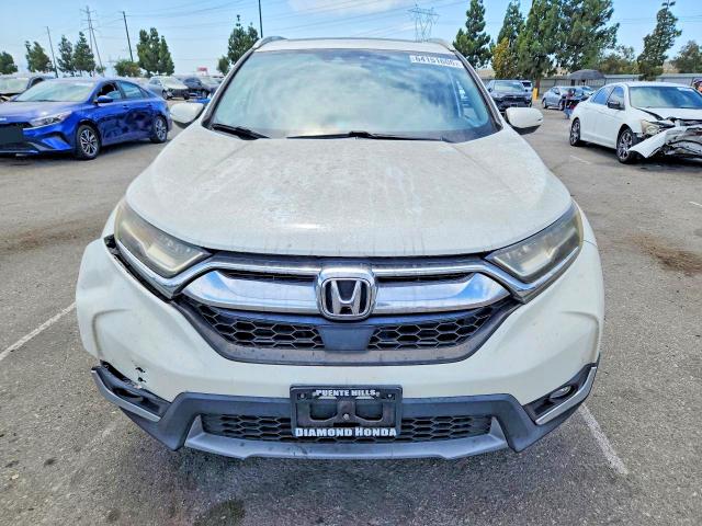 Photo 5 from auction – 2017 HONDA CR-V with VIN 2HKRW1H97HH506888