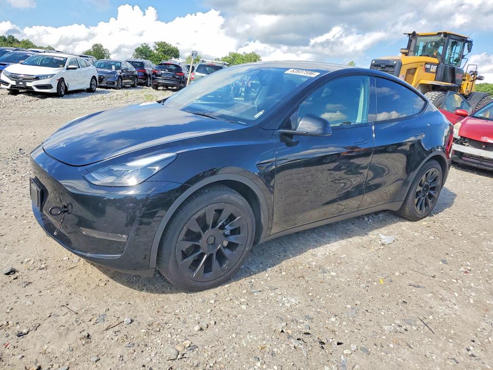 TESLA MODEL Y 2023 con VIN 7SAYGAEE6PF769013 - Foto de la subasta