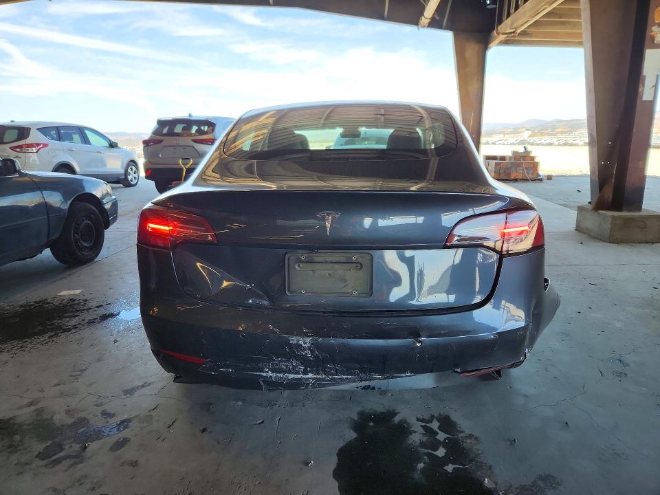 Photo 6 from auction – 2021 TESLA MODEL 3 with VIN 5YJ3E1EA5MF876690