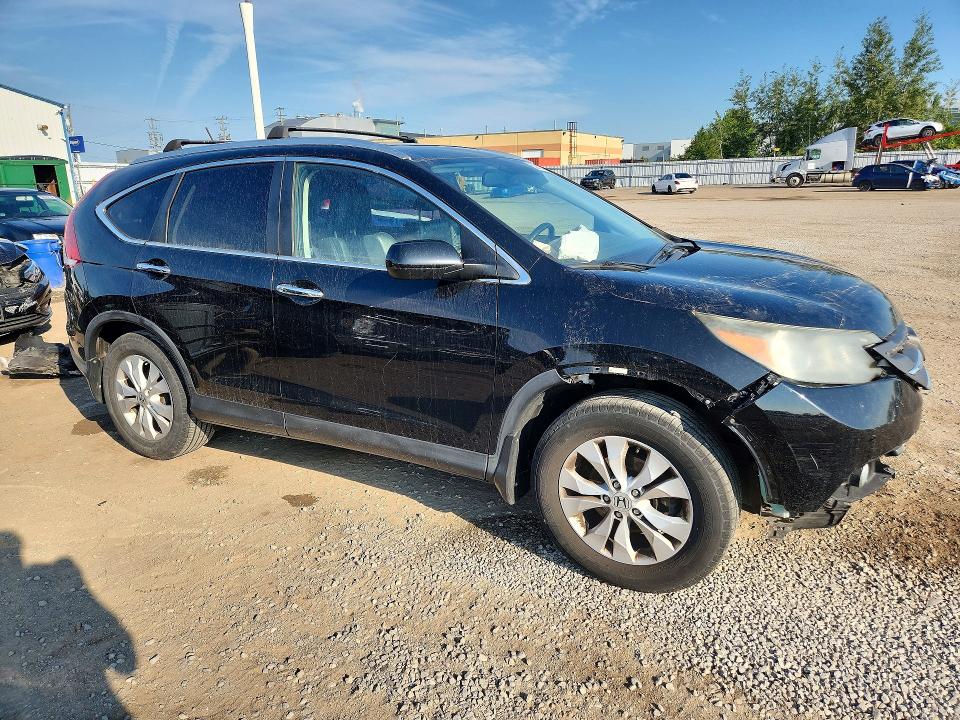 Photo 4 from auction – 2012 HONDA CR-V with VIN 5J6RM4H95CL800053