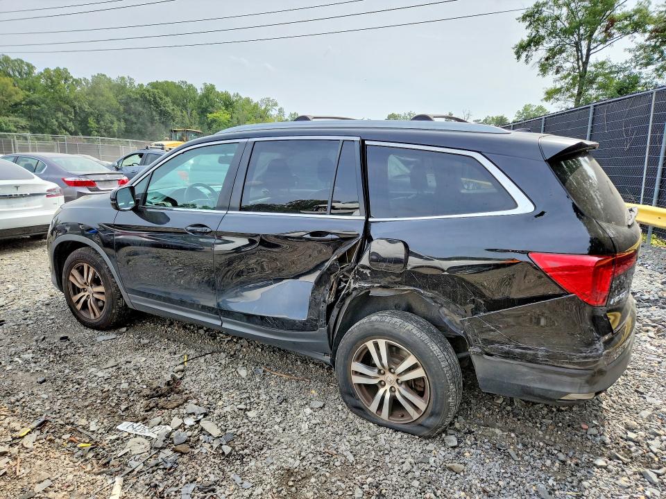 Photo 2 from auction – 2016 HONDA PILOT with VIN 5FNYF6H55GB085708
