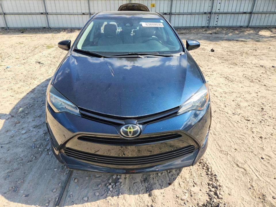 Photo 5 from auction – 2018 TOYOTA COROLLA with VIN 5YFBURHE3JP813812