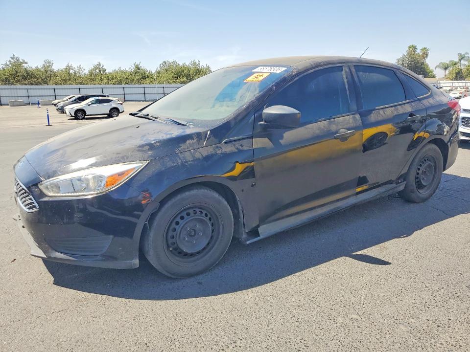 FORD FOCUS 2018 with VIN 1FADP3E21JL205678 - Photo from auction