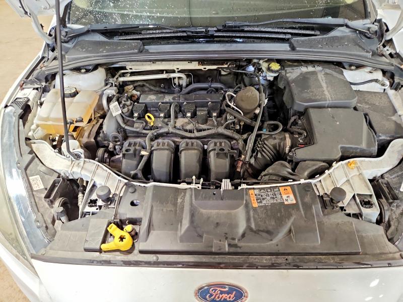Photo 11 from auction – 2015 FORD FOCUS with VIN 1FADP3F20FL245174