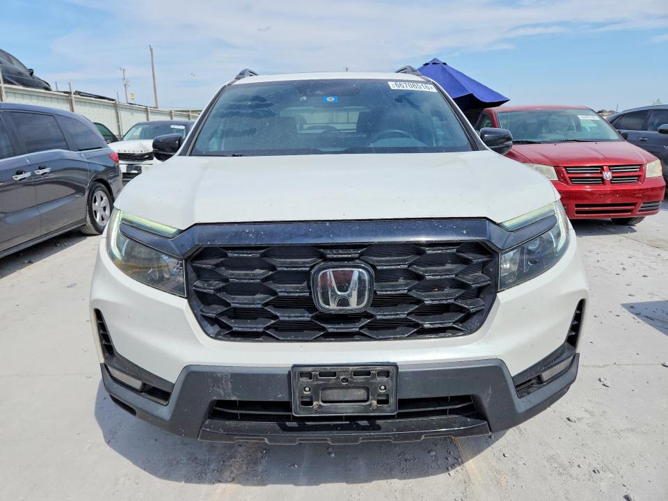 Снимка 5 от търг – 2022 HONDA PASSPORT с VIN 5FNYF8H05NB018362