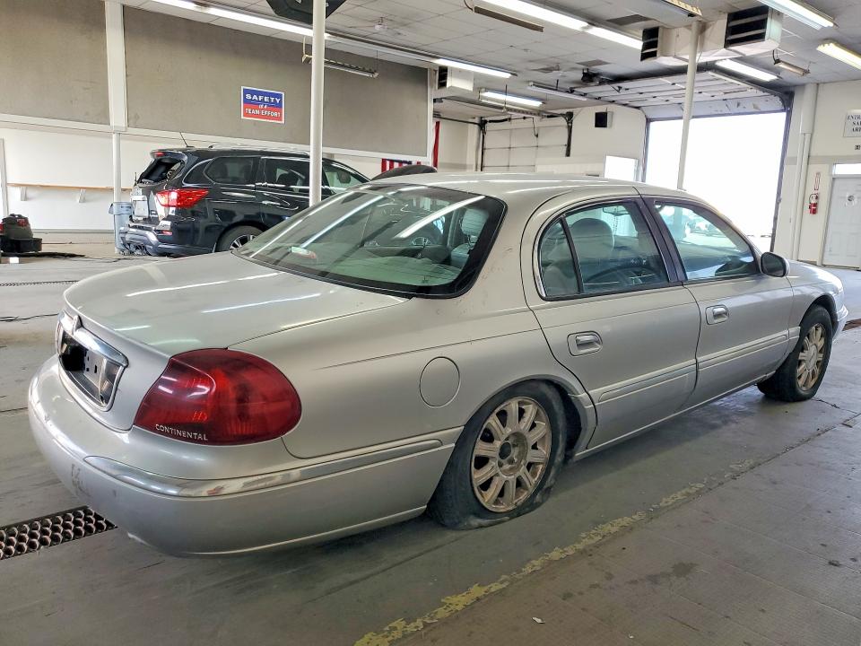 Photo 3 from auction – 2000 LINCOLN CONTINENTAL with VIN 1LNHM97VXYY785682