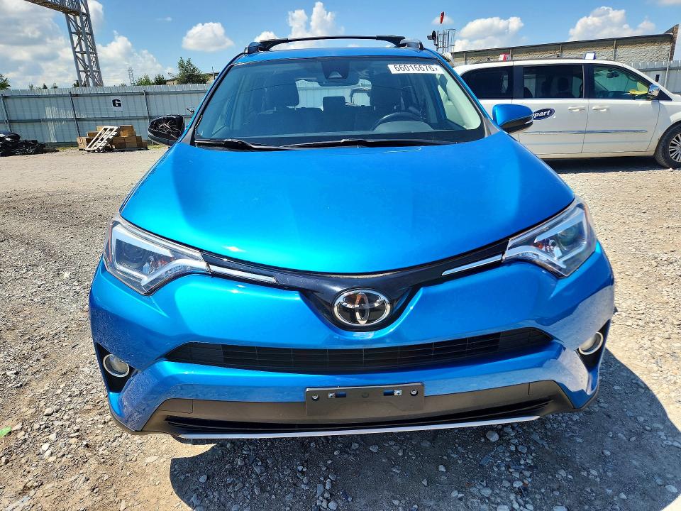 Photo 5 from auction – 2017 TOYOTA RAV4 with VIN JTMDFREV3HJ165751