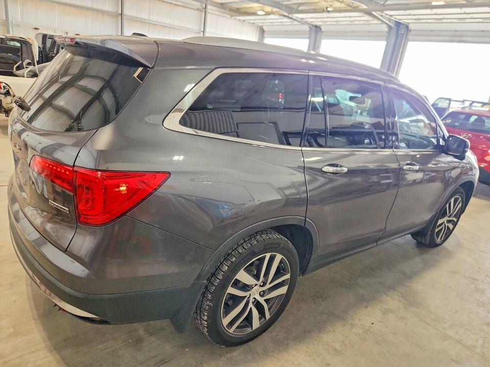 Снимка 3 от търг – 2017 HONDA PILOT с VIN 5FNYF5H91HB046449