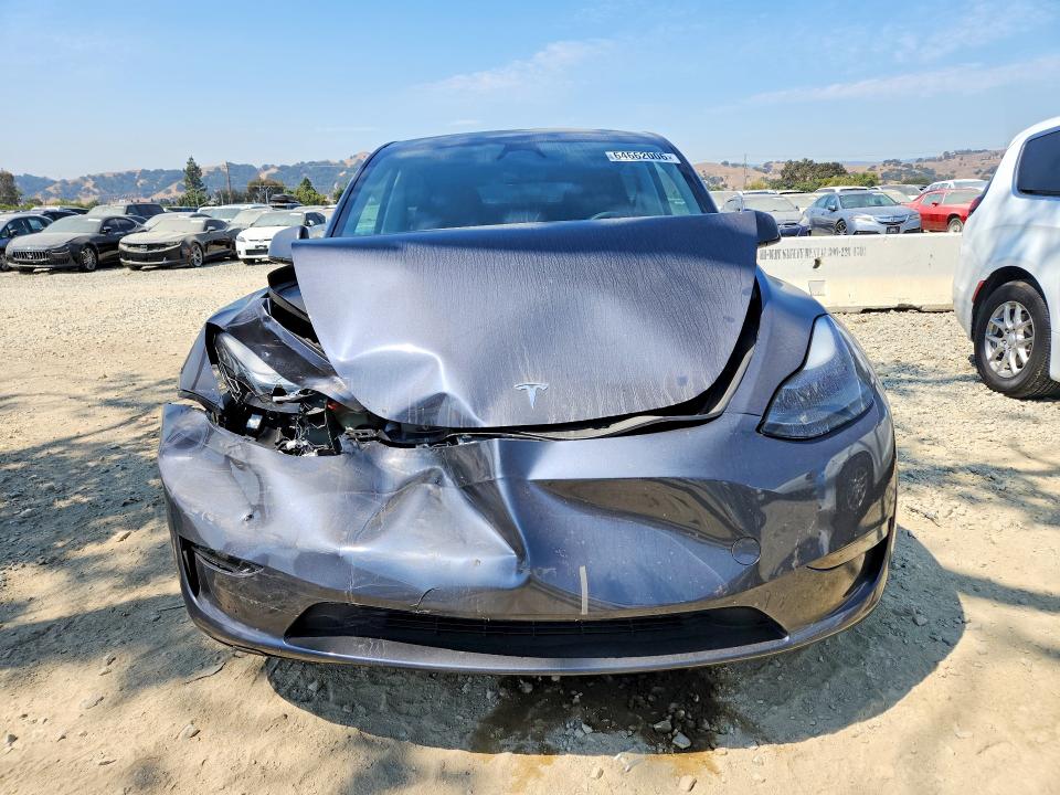 Photo 5 from auction – 2023 TESLA MODEL Y with VIN 7SAYGDED3PF942270